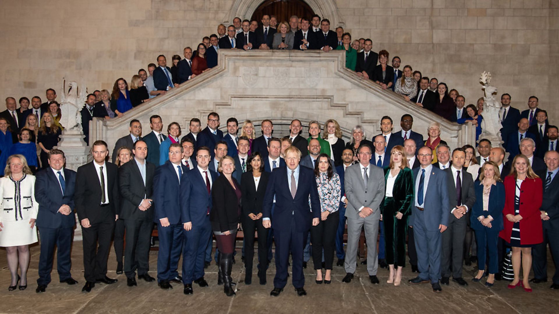 Prime Minister Boris Johnson poses with newly-elected Conservative MPs at the Houses of Parliament. Photo: Leon Neal/Getty Images - Credit: Getty Images