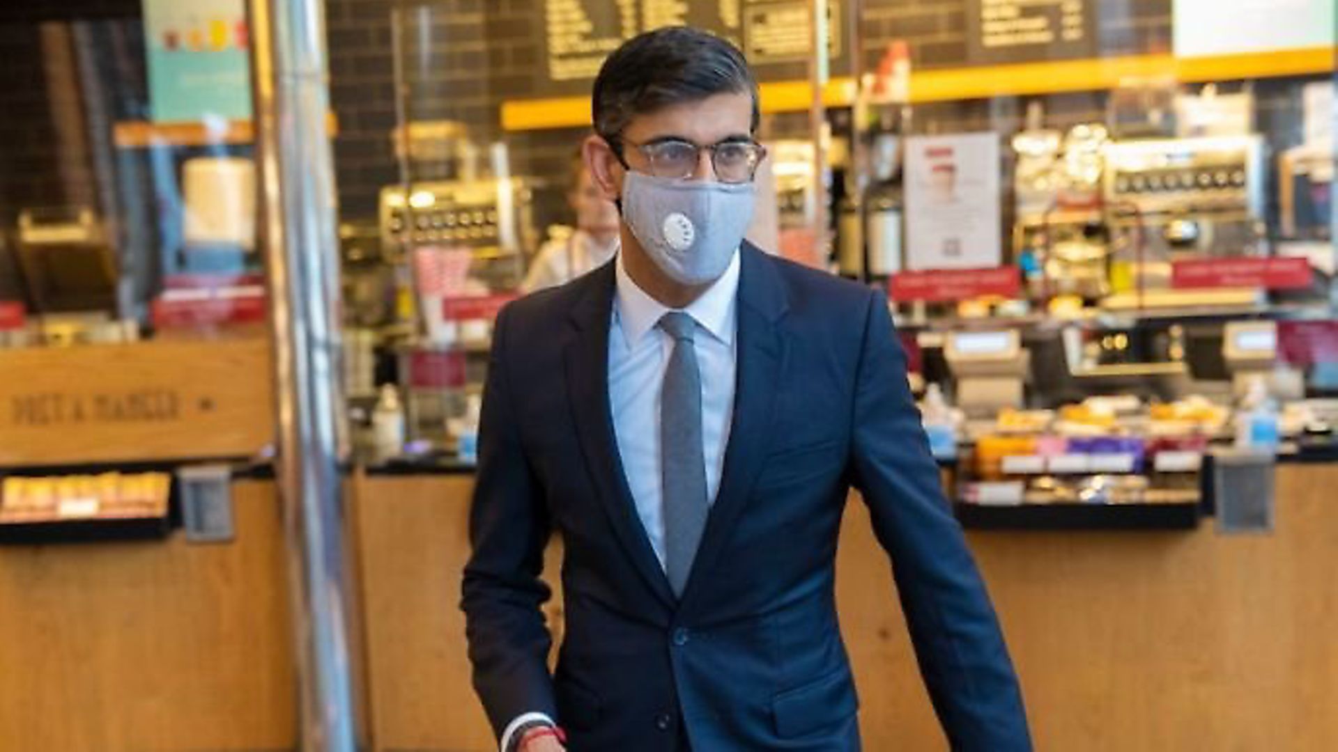 Chanellor Rishi Sunak pictured with his face mask leaving a Pret store; Twitter - Credit: Archant