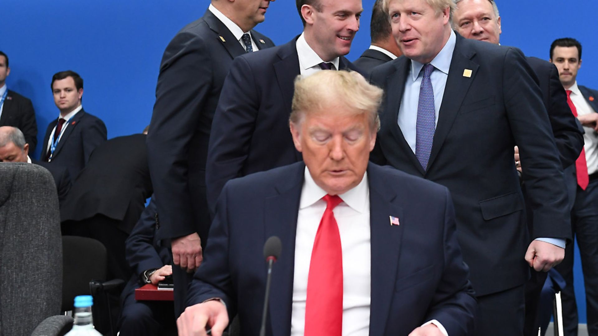 US President Donald Trump (front) with Foreign Secretary Dominic Raab (centre left) and Prime Minister Boris Johnson (centre right). Photograph: Stefan Rousseau/PA. - Credit: PA