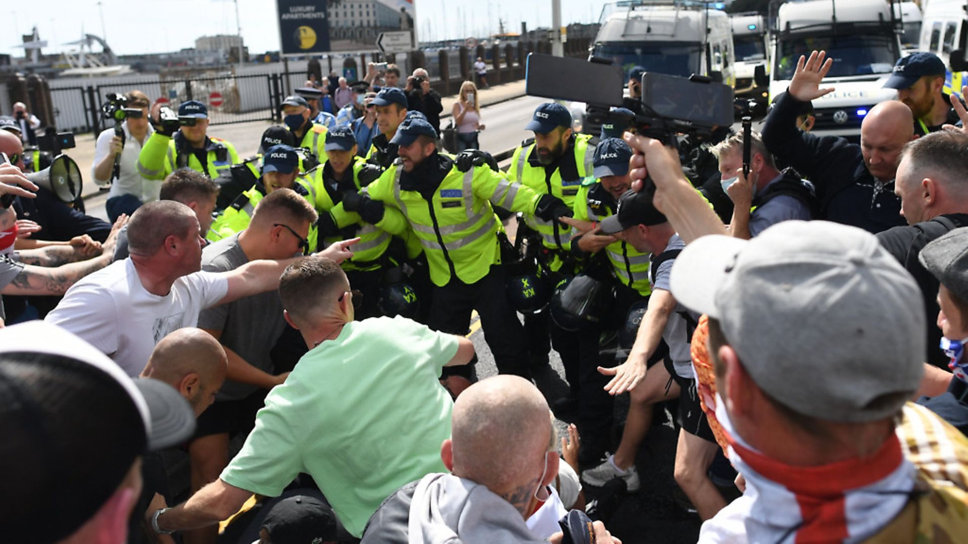 Anti-migrant protesters demonstrate in Dover against immigration and the journeys made by refugees crossing the Channel to Kent. Photograph: Stefan Rousseau/PA. - Credit: PA