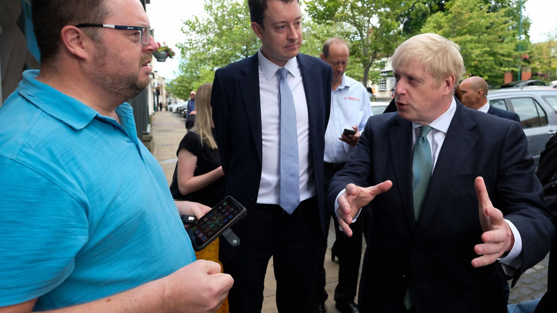 Conservative party leader Boris Johnson and Simon Clarke MP speak to a steelworker during a visit to Guisborough, North Yorkshire. Photograph: Ian Forsyth/PA. - Credit: PA