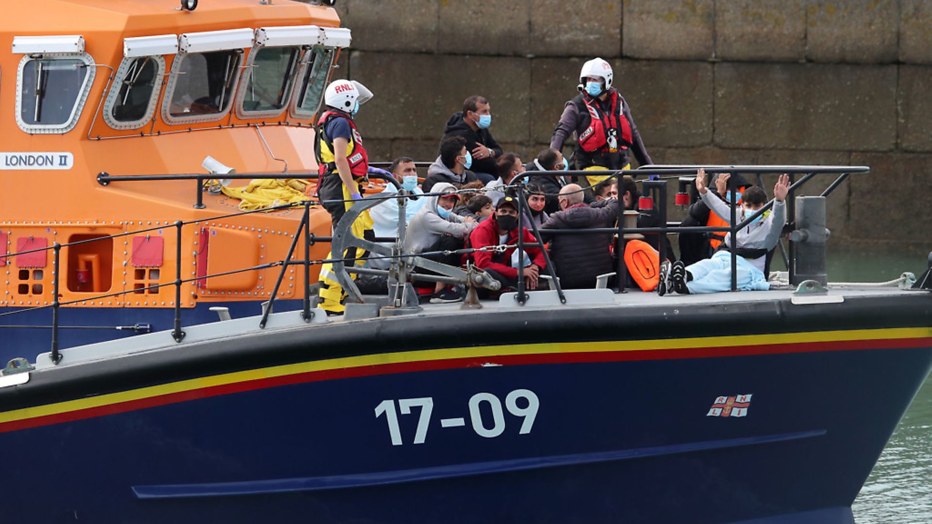 A group of people thought to be migrants are brought into Dover, Kent, onboard the Dover RNLI lifeboat. Photograph: Gareth Fuller/PA Wire. - Credit: PA