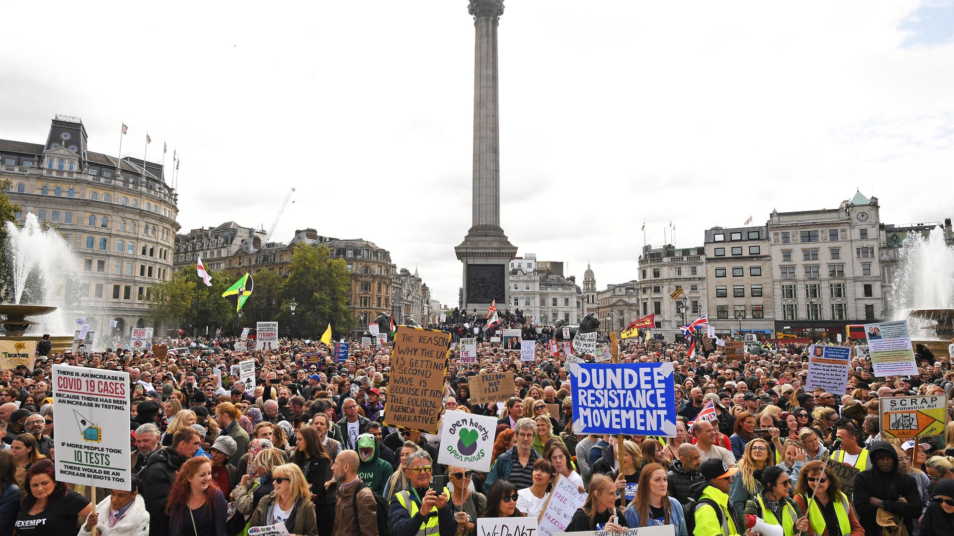People take part in a 'We Do Not Consent' rally at Trafalgar Square in London, organised by Stop New Normal, to protest against coronavirus restrictions. - Credit: PA