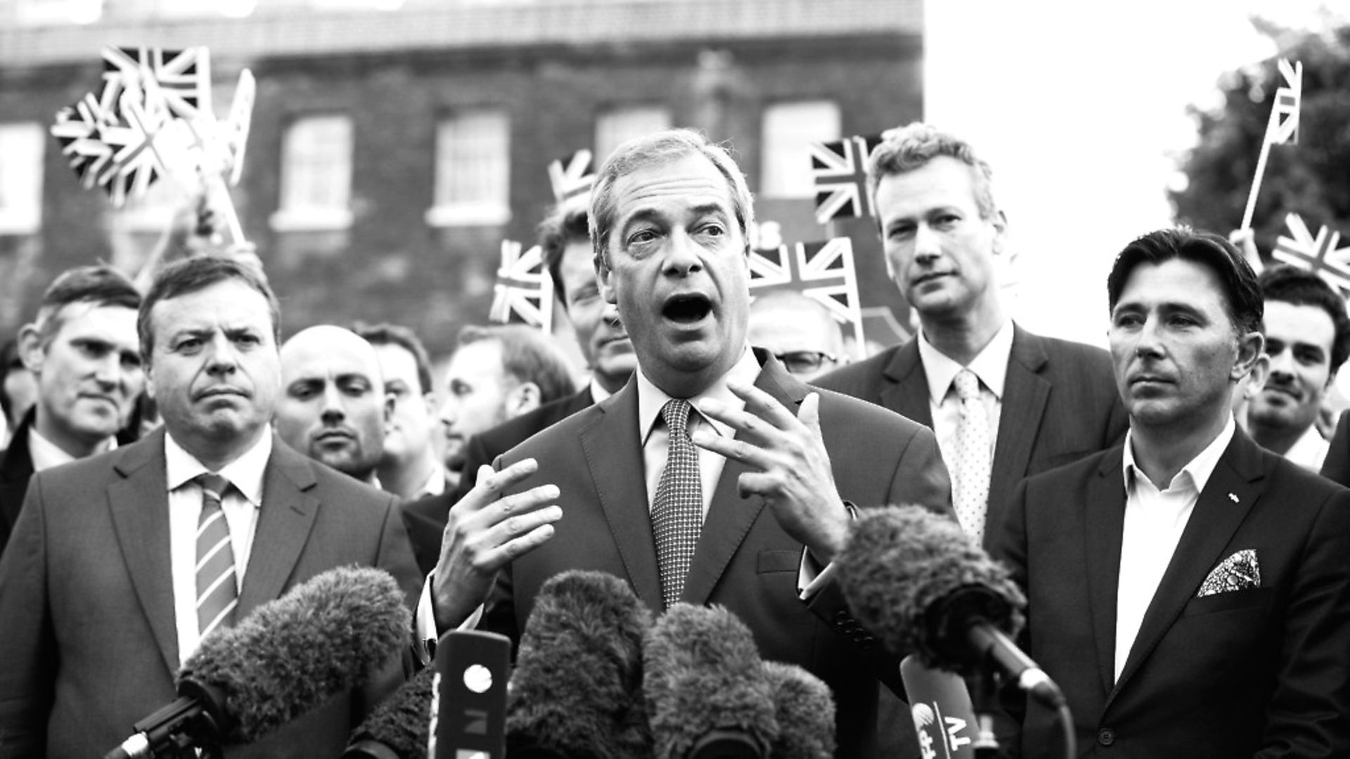 Nigel Farage supported by Leave EU's Arron Banks (left) and Andy Wigmore (right). Photograph: Isabel Infantes/EMPICS Entertainment. - Credit: EMPICS Entertainment