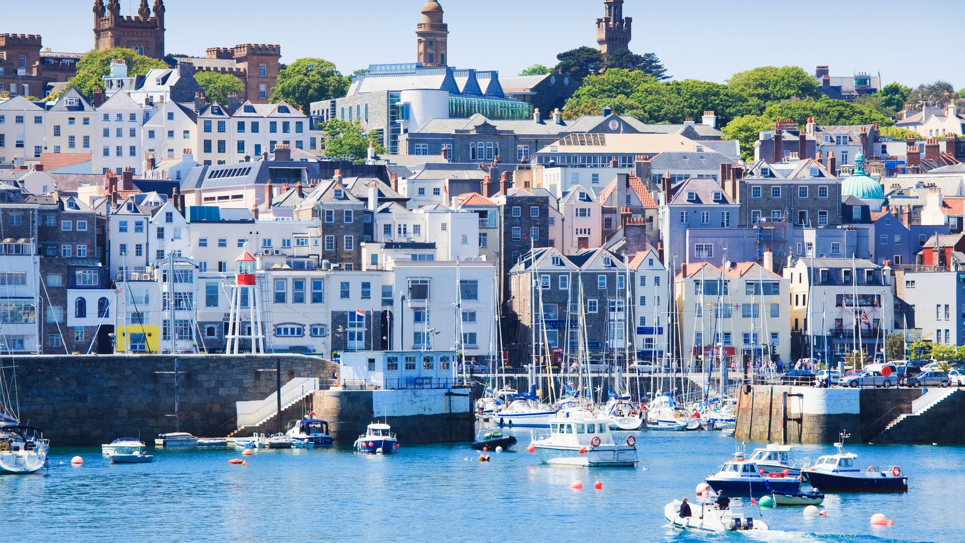 The harbour of St. Peter Port, Guernsey, Channel Islands, United Kingdom - Credit: Getty Images
