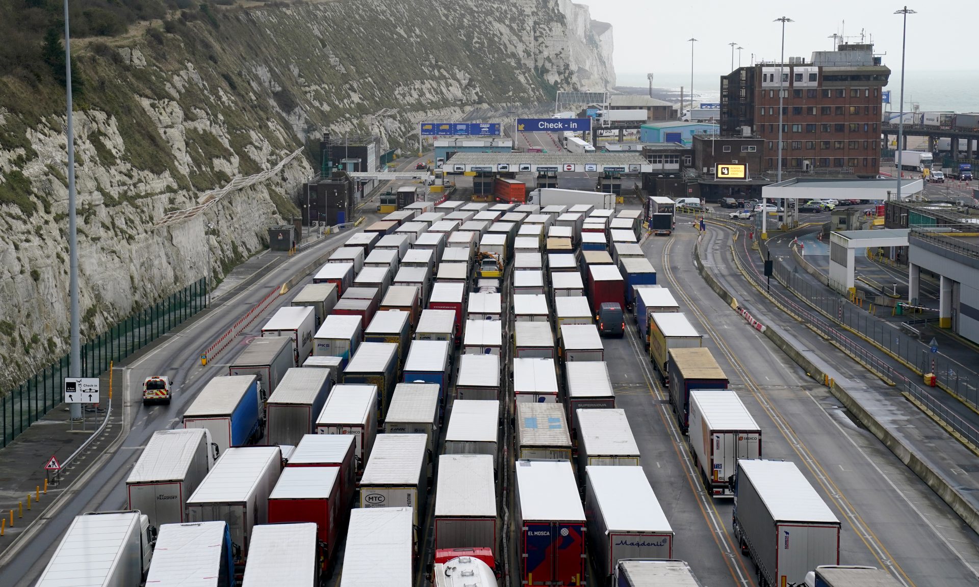 Lorries queue at the entrance to the Port of Dover, where delays are being caused to the transportation of goods across the channel after exports between Great Britain and the EU became subject to full customs controls on January 1. Photo: Gareth Fuller/PA Wire/PA Images.