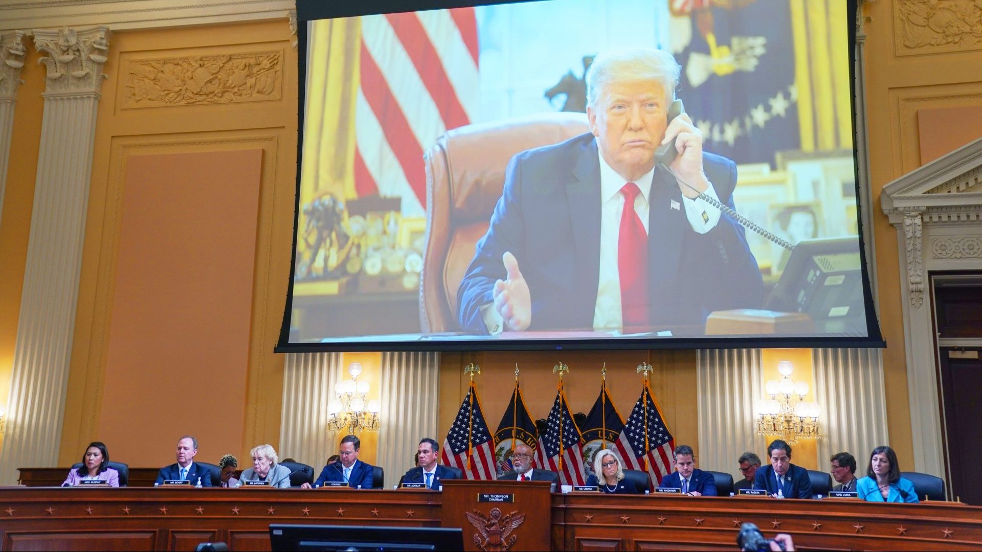 Photos of then-President Trump
are shown during a House
Select Committee to investigate the January 6 hearing. Photo: Kent Nishimura/Los
Angeles Times/Getty Images