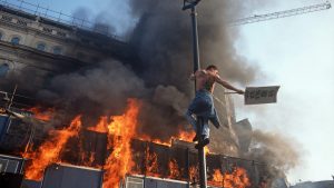 Trafalgar Square in
flames during anti-poll tax riots, March 1990. Photo: Richard Baker/In Pictures/Getty