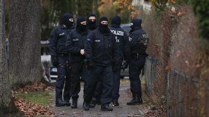 Police officers in Berlin during day of raids across 11 German states on which 25 arrests were made of suspects in the so-called Day X coup attempt linked to members of the ReichsbÜrger movement. Photo: Abdulhamid Hosbas/Anadolu 
 Agency