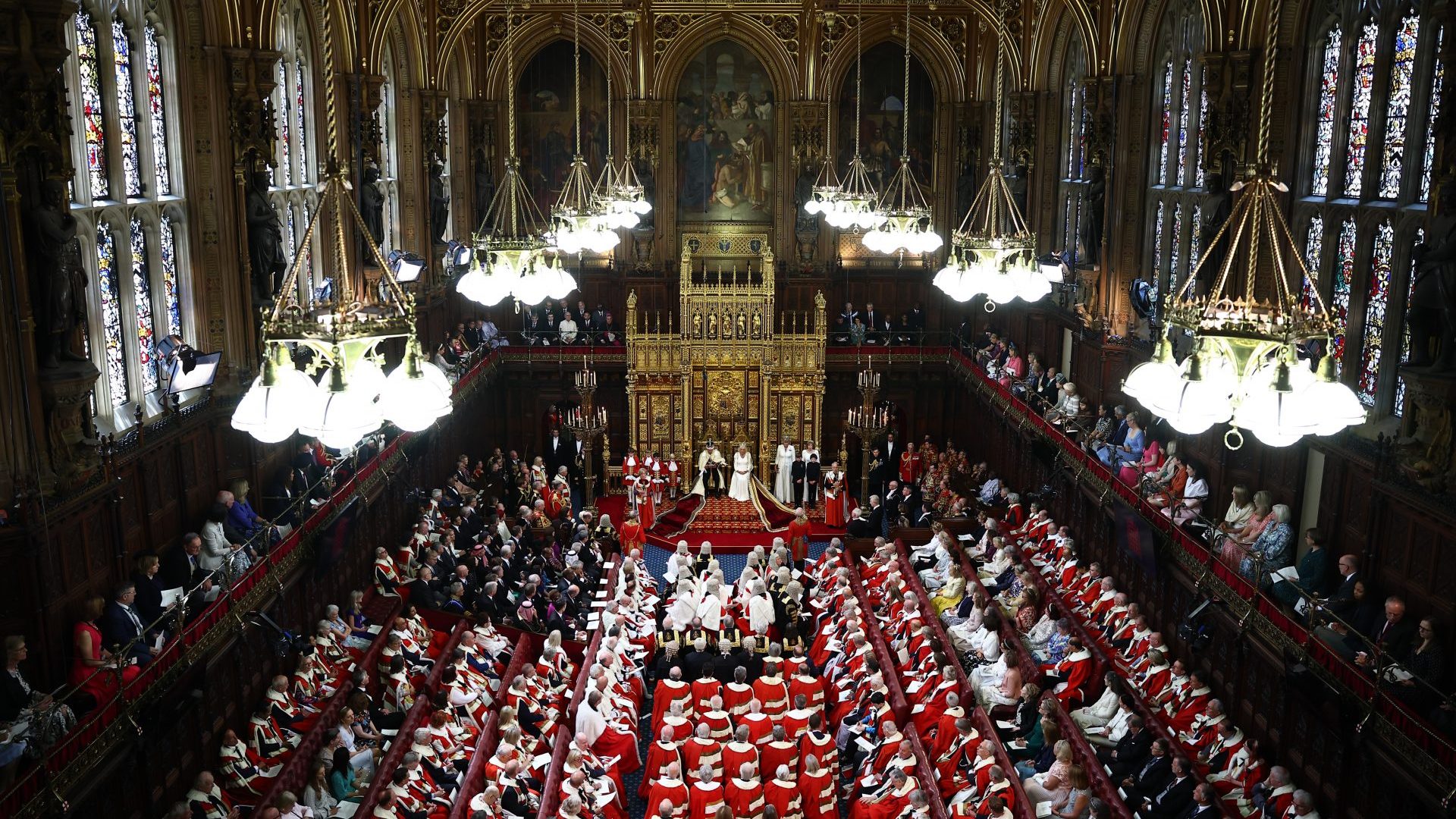 King Charles III, wearing the Imperial State Crown and the Robe of State reads the King's Speech (Photo by Henry Nicholls - WPA Pool/Getty Images)