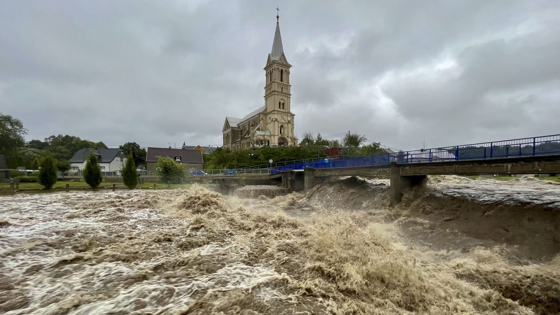 A torrent of water flows along the River Bělá during heavy rain on September 14 in Mikulovice, Czech Republic. Photo: Gabriel Kuchta/Getty