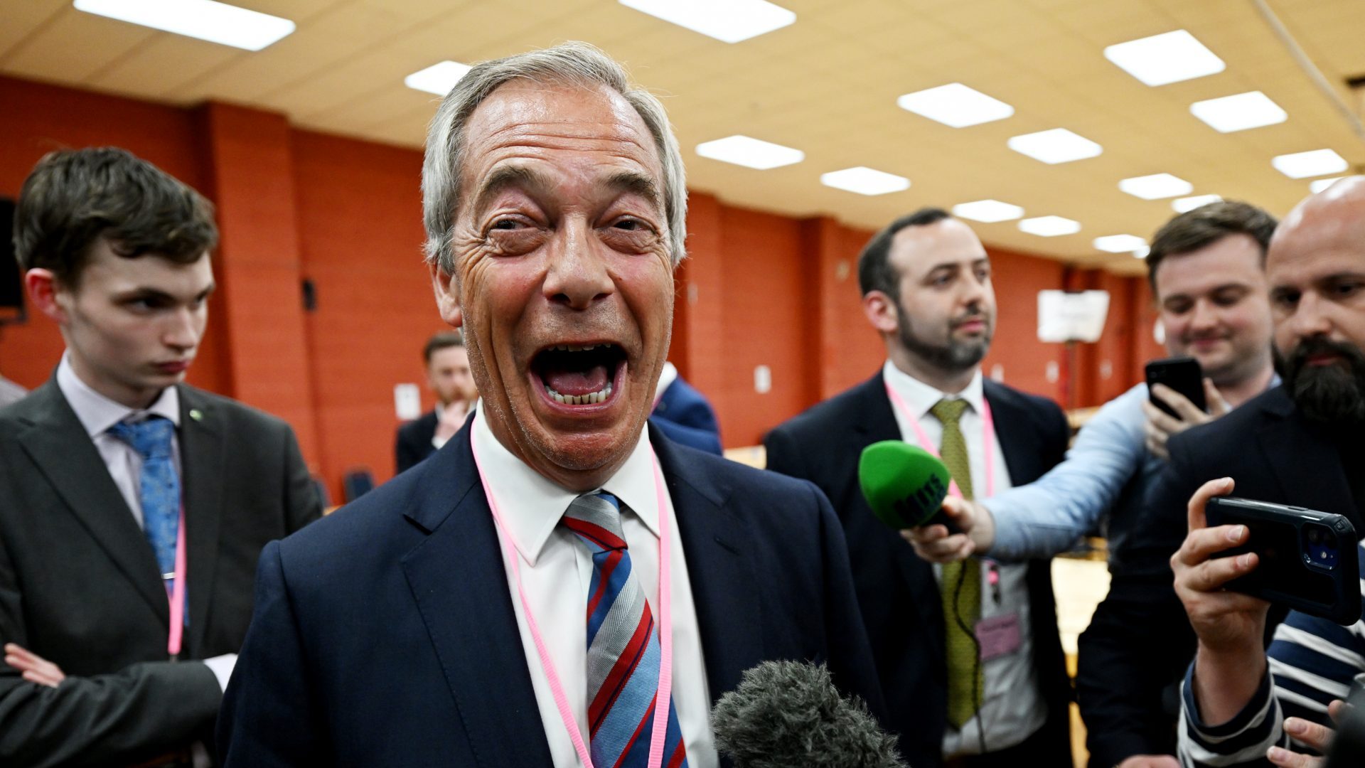Nigel Farage reacts as Reform Party candidate Sarah Pochin is declared the winner of the Runcorn and Helsby by-election, following a recount. Pochin won by six votes. Photo: Anthony Devlin/Getty Images