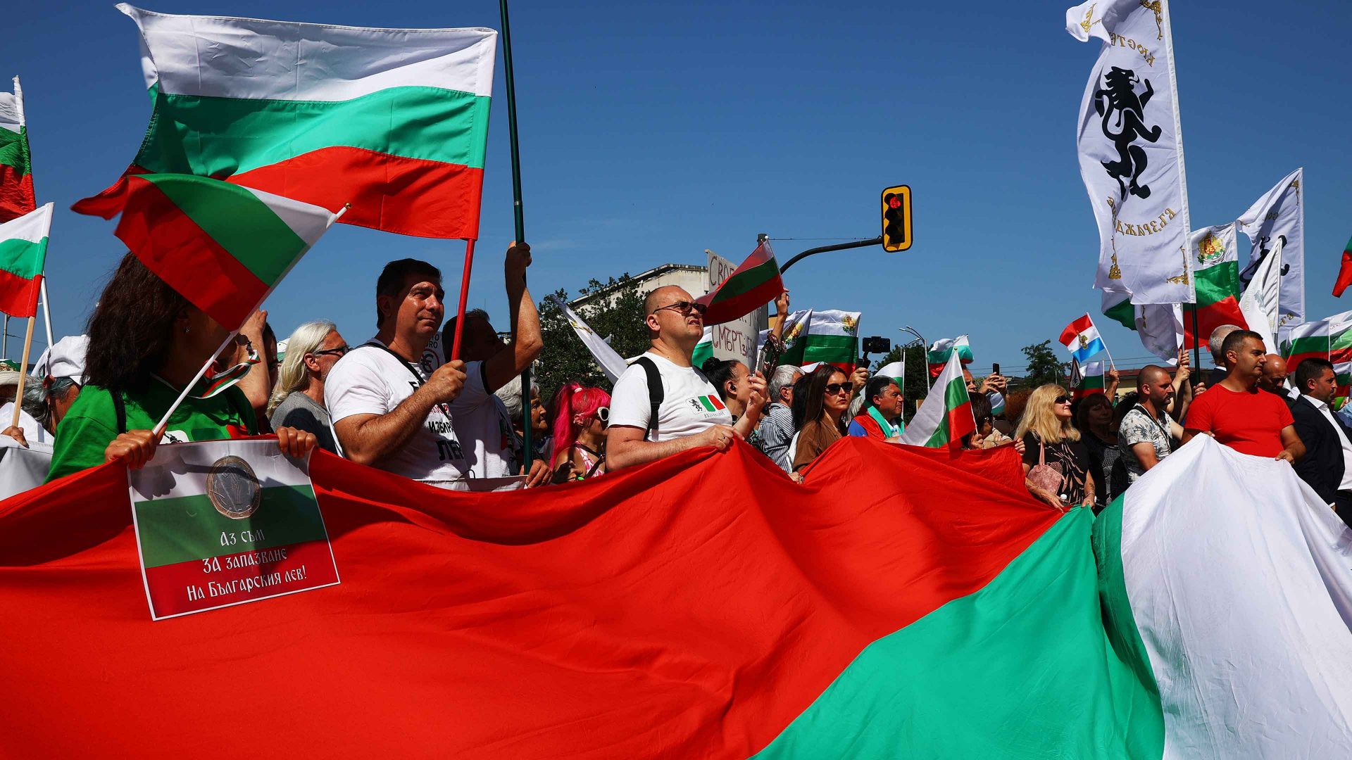 People attend a protest against the adoption of the euro in front of the ruling party GERB headquarters in Sofia, Bulgaria, on June 12, 2025. Photo: STR/NurPhoto via Getty Images