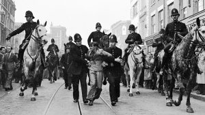 Eddie Worth’s image of an anti-fascist demonstrator being arrested by police during the Battle of Cable Street in London, October 1936. Image: Alamy