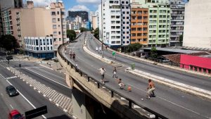 On a Sunday, the Minhocão, a major through road running through the heart of São Paulo, serves as an improvised football pitch and jogging and cycling surface for city dwellers. Image: Pictures Ltd/Corbis/Getty