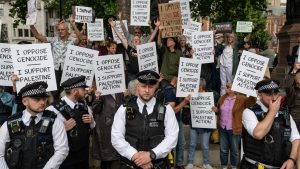 Police surround Palestine Action activists during last weekend’s protest in Parliament Square. Image: Guy Smallman/Getty
