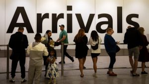 People wait to greet friends and relatives at Heathrow Airport Terminal 4. Photo: Andy Soloman/UCG/Universal Images Group via Getty Images