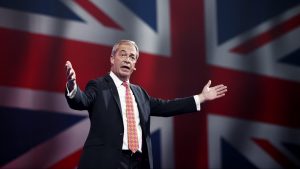 Reform UK party leader Nigel Farage delivers a speech on the opening day of the Reform UK 2024 annual Party Conference. Photo:  BENJAMIN CREMEL/AFP via Getty Images
