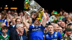 Brian Ó Beaglaoich of Kerry lifts the Sam Maguire cup in celebration following their side's victory in the GAA Football All-Ireland Senior Championship final match between Kerry and Donegal. Photo: Stephen McCarthy/Sportsfile via Getty Images
