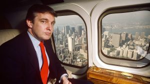 Real estate developer Donald J Trump flies from New York City to Atlantic City in his Puma helicopter, 1987. Image: Joe McNally/Getty
