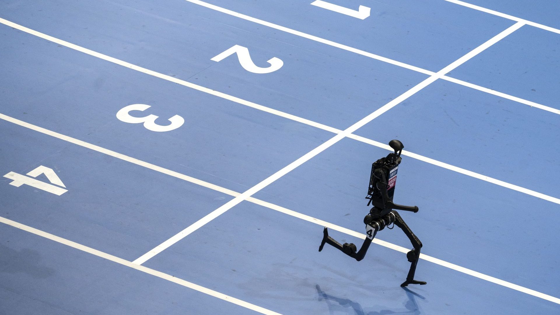 a robot runs in the 1500m final at this month’s World Humanoid Robot Games at the National Speed Skating Oval in Beijing