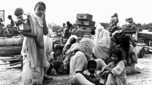 A refugee family in a camp following the partition of India and Pakistan in 1947. Photo: KEYSTONE-FRANCE/Gamma-Rapho/Getty