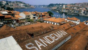 Elevated view of the Sandeman wine and port cellars on the Douro River in Porto, Portugal. Photo: UPI/Bettmann Archive/Getty Images