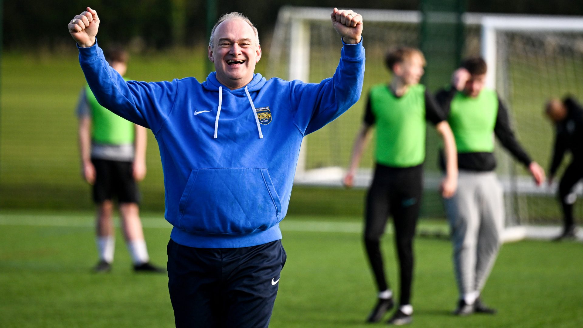Ed Davey, leader of the Liberal Democrats, celebrates a goal as he plays football with police officers and young people at the Wiltshire FA headquarters in Devizes, January 2025. Image: Finnbarr Webster/Getty