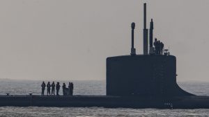 Crew members on the deck of a US Navy nuclear-powered attack submarine. IMAGE: HORACIO VILLALOBOS/CORBIS/GETTY