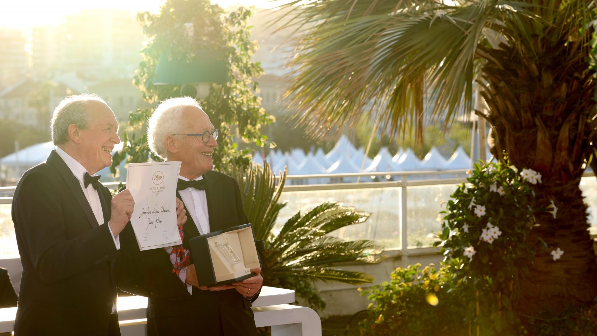 Luc Dardenne and Jean-Pierre Dardenne pose with the Best Screenplay Award for “Young Mothers" during the Palme D'Or winners photocall. Photo: Tristan Fewings/Getty Images
