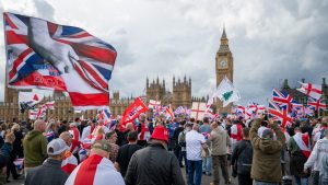 Members of the public cross Westminster Bridge bound for Whitehall during the Unite The Kingdom rally. Photo: Ben Montgomery/Getty Images