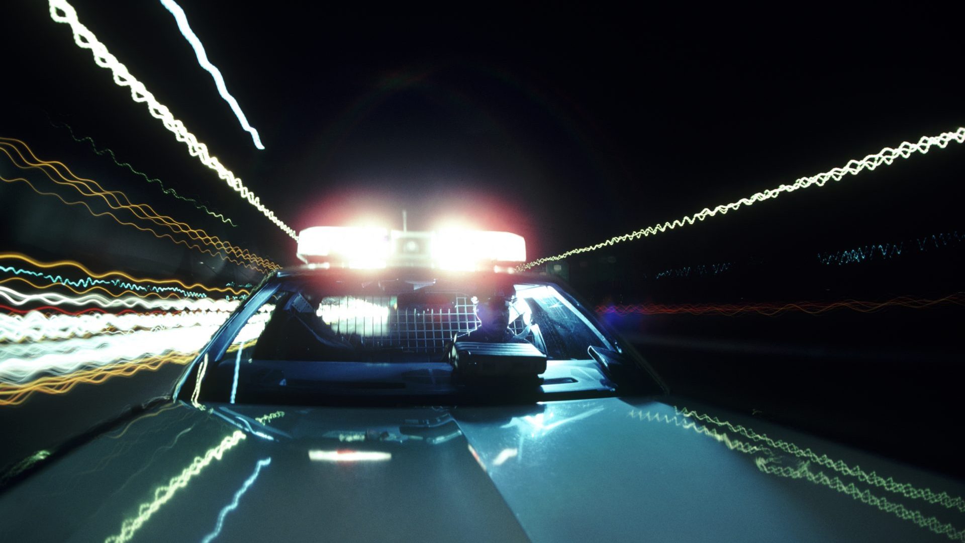 Suffolk County police car, on DWI patrol, with red lights flashing on the Long Island Expressway. Photo: TNW/Getty