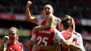 Arsenal’s Mariona Caldentey celebrates with her teammates after scoring a goal against Olympique Lyonnais. Image: Alex Burstow/Arsenal FC/Getty