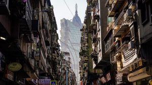 A view of the Hotel Lisboa from an alleyway in Macau. Image: VCG/Getty
