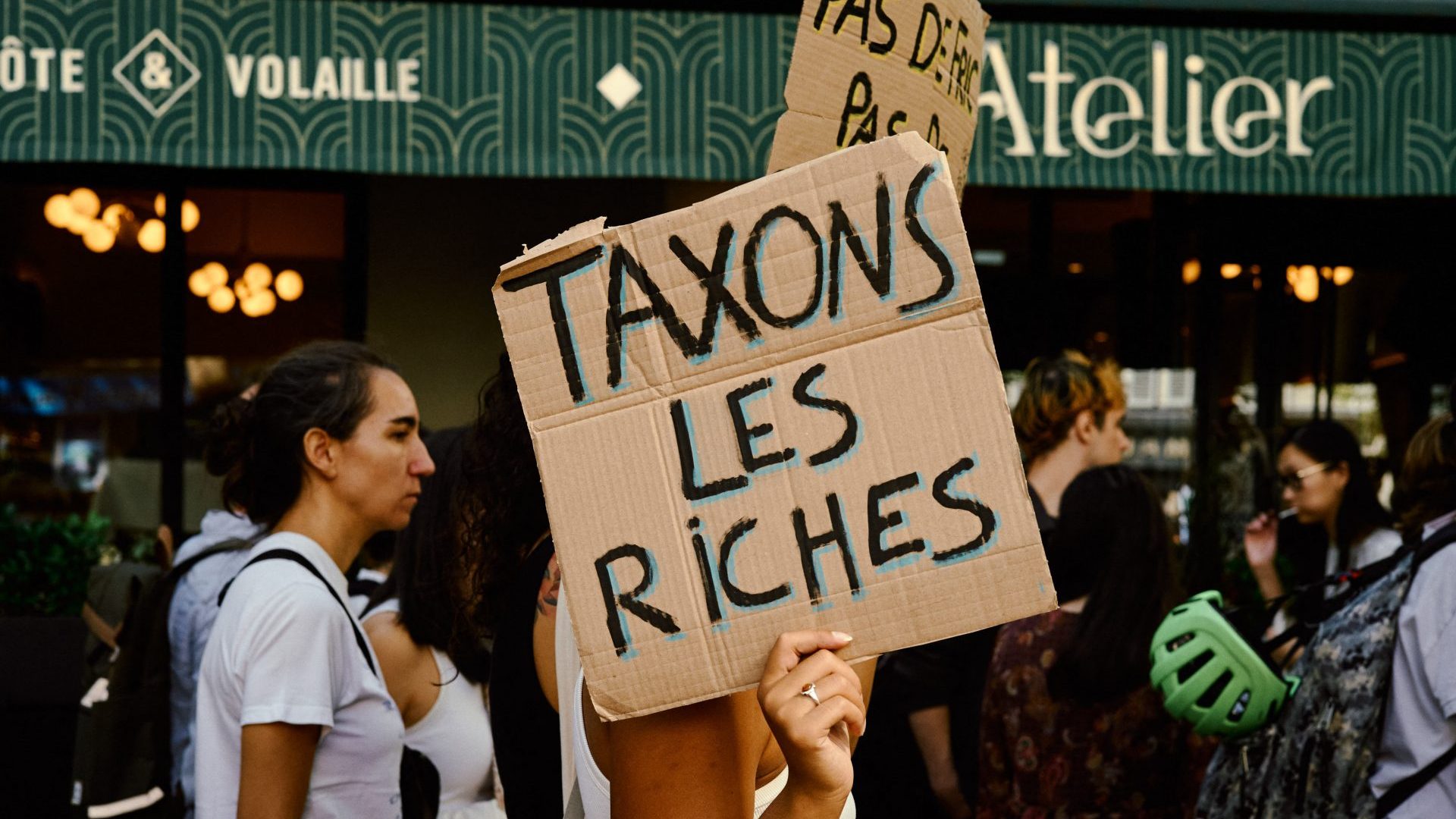 Thousands rally in Paris against government austerity measures on September 18.