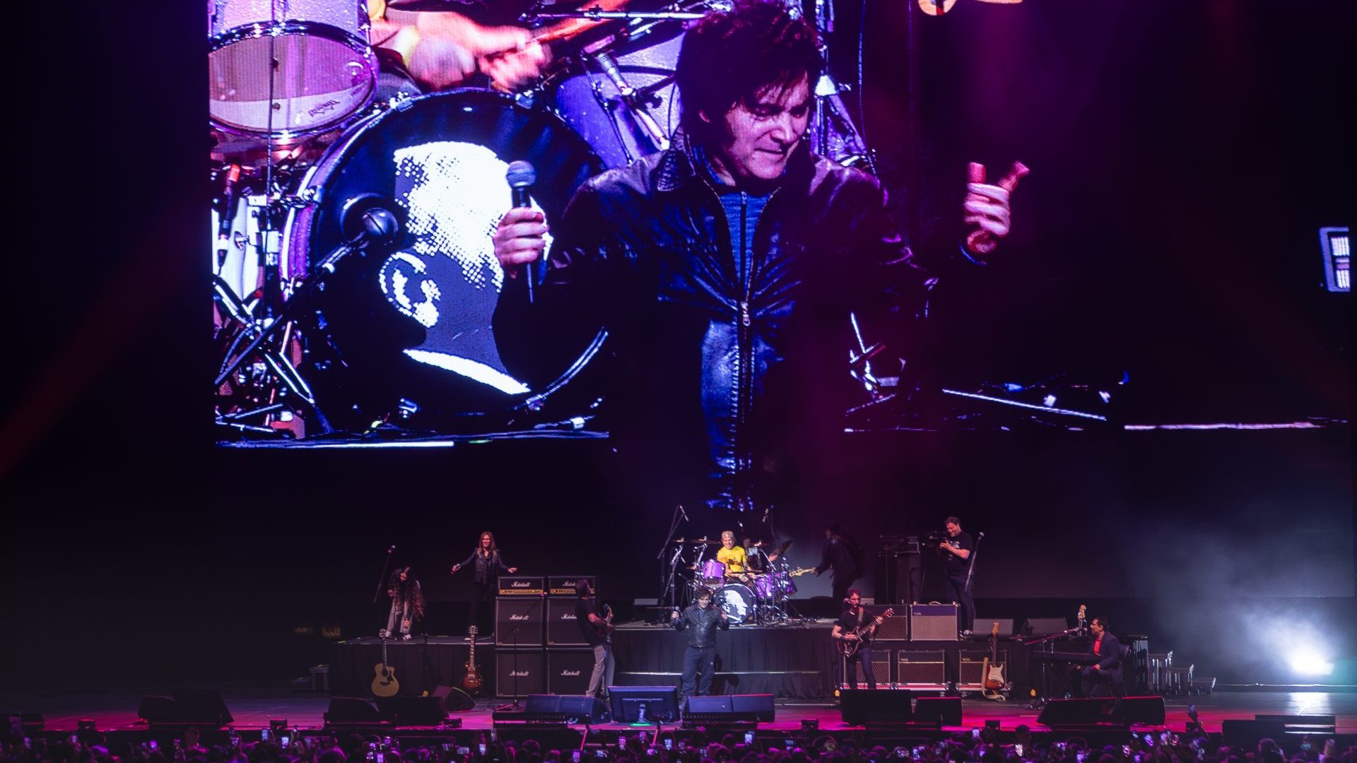 Javier Milei takes to the stage at the presentation of his latest book at the Movistar Arena in Buenos Aires. Image: Guillermo Castro/NurPhoto/Getty