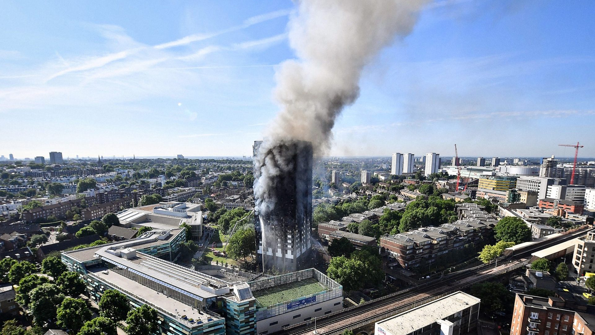 Smoke rises from Grenfell Tower in west London in the early hours of June 14, 2017 after it was engulfed in flames during the night. Seventy-two people died in the fire. Image: Leon Neal/Getty