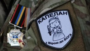 Chaplains Chevron on Sasha's arm. Credit: Lucy Ash