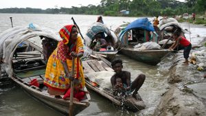 Members of the Manta community on the Arial Khan River. IMAGE: PIYAS BISWAS/GETTY