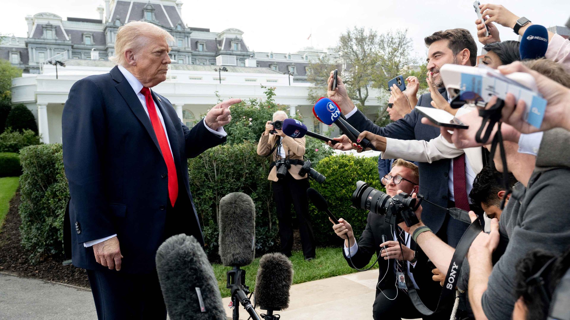 Donald Trump speaks to the press beefore boarding Marine One prior to departing from the South Lawn of the White House. Photo: SAUL LOEB/AFP via Getty Images