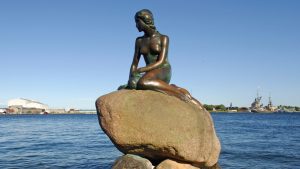 The bronze statue of Hans Christian Andersen’s Little Mermaid at the entrance to Copenhagen harbour. Image: Jeff Overs/BBC News & Current Affairs/Getty