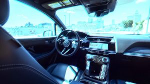 A Waymo robotaxi Jaguar I-PACE drives around downtown Los Angeles. Image: Allen J Schaben/Los Angeles Times/Getty