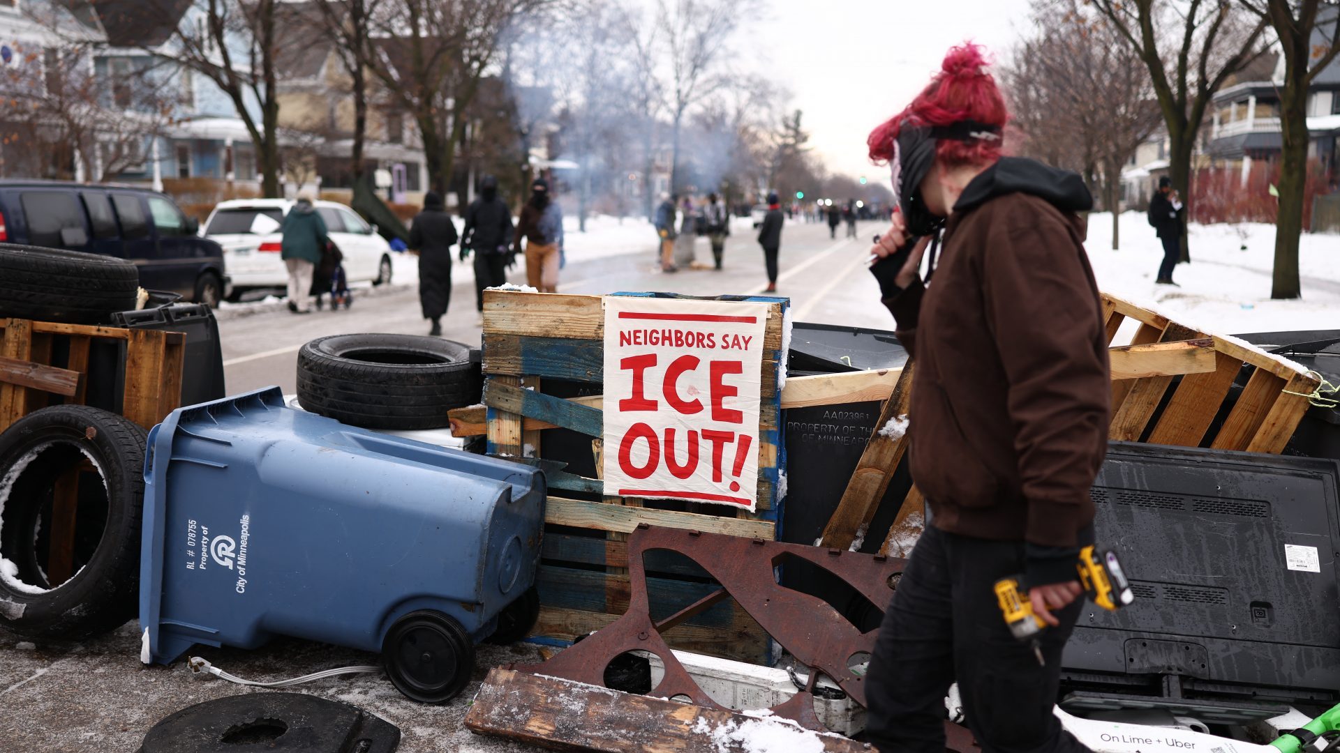 Demonstrators gather at the street where 37-year-old Renee Nicole Good was shot and killed at point blank range on January 7 by a US Immigration and Customs Enforcement (ICE) agent. Photo: CHARLY TRIBALLEAU / AFP via Getty Images