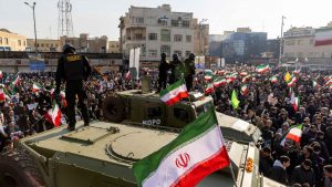 Security forces monitor a pro-government rally in Tehran. Photo: Stringer/Getty Images
