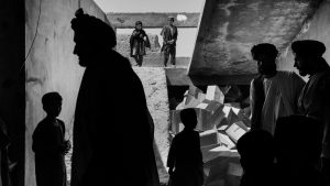 Patients and relatives crowd the entrance of the clinic in Sangin, Helmand province in June 2022. Image: Lorenzo Tugnoli