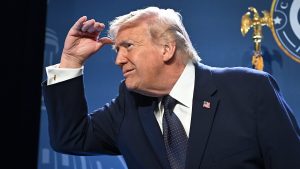 Donald Trump leaves the stage after speaking to the Republican Members Issues Conference in Miami. Photo: Roberto Schmidt/Getty Images