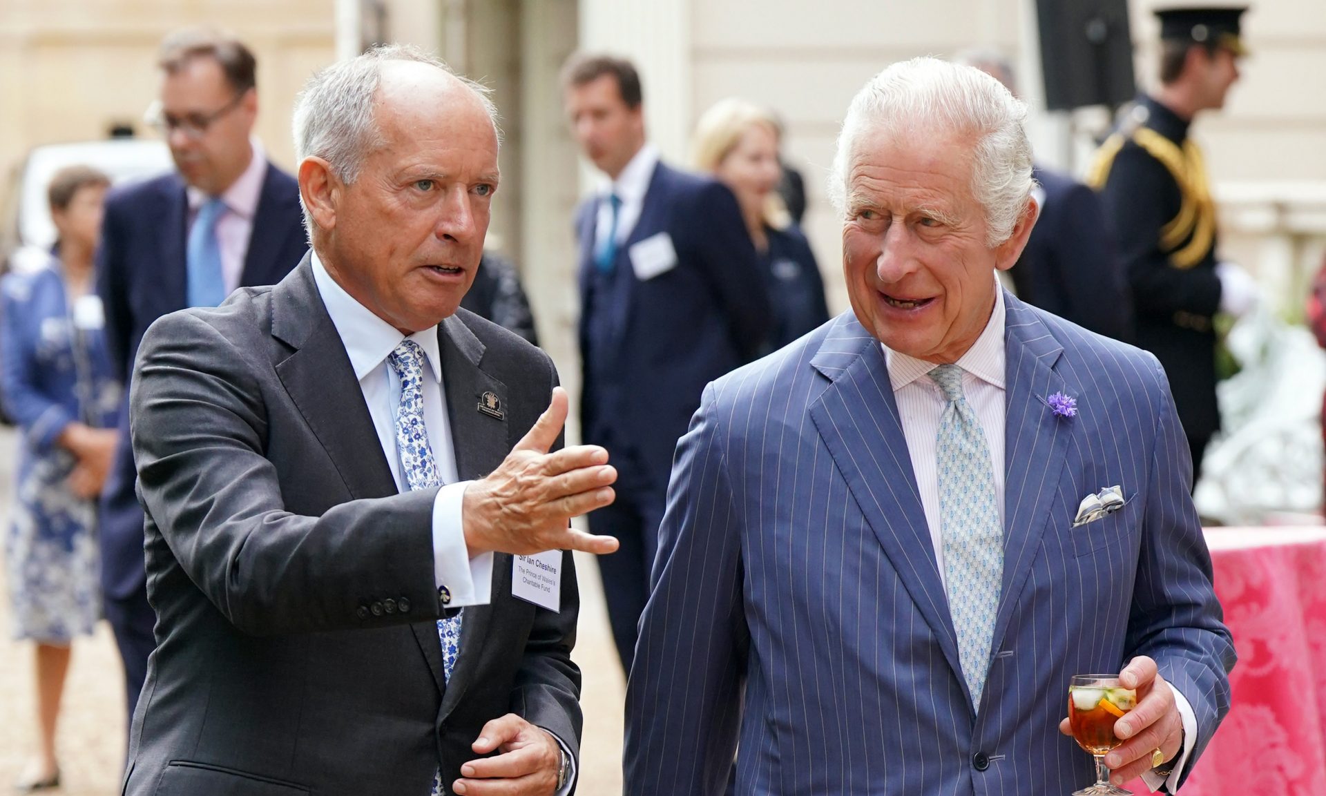 King Charles III speaks to Sir Ian Cheshire during a reception to celebrate four decades of the Prince of Wales's Charitable Fund at Clarence House on July 12, 2023 in London, England. (Photo by Jonathan Brady - WPA Pool/Getty Images