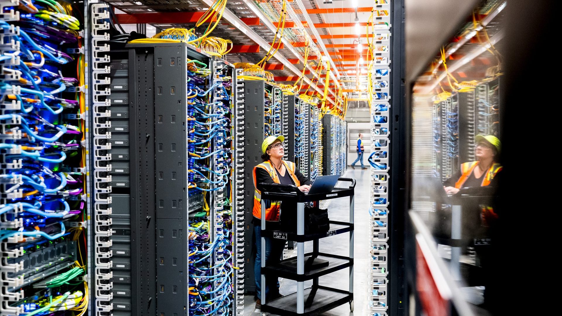 A technician works at an Amazon Web Services AI data center in New Carlisle, Indiana. Photo: Noah Berger/Getty Images via Amazon Web Services