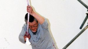 Japanese abstract painter Kazuo Shiraga at the Hyogo Prefectural Museum of Modern Art, 2001. Image: Asahi Shimbun/Getty