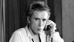 Johnny Rotten performs at Notre Dame Church Hall in central London, November 1976. Image: Ian Dickson/Redferns/Getty
